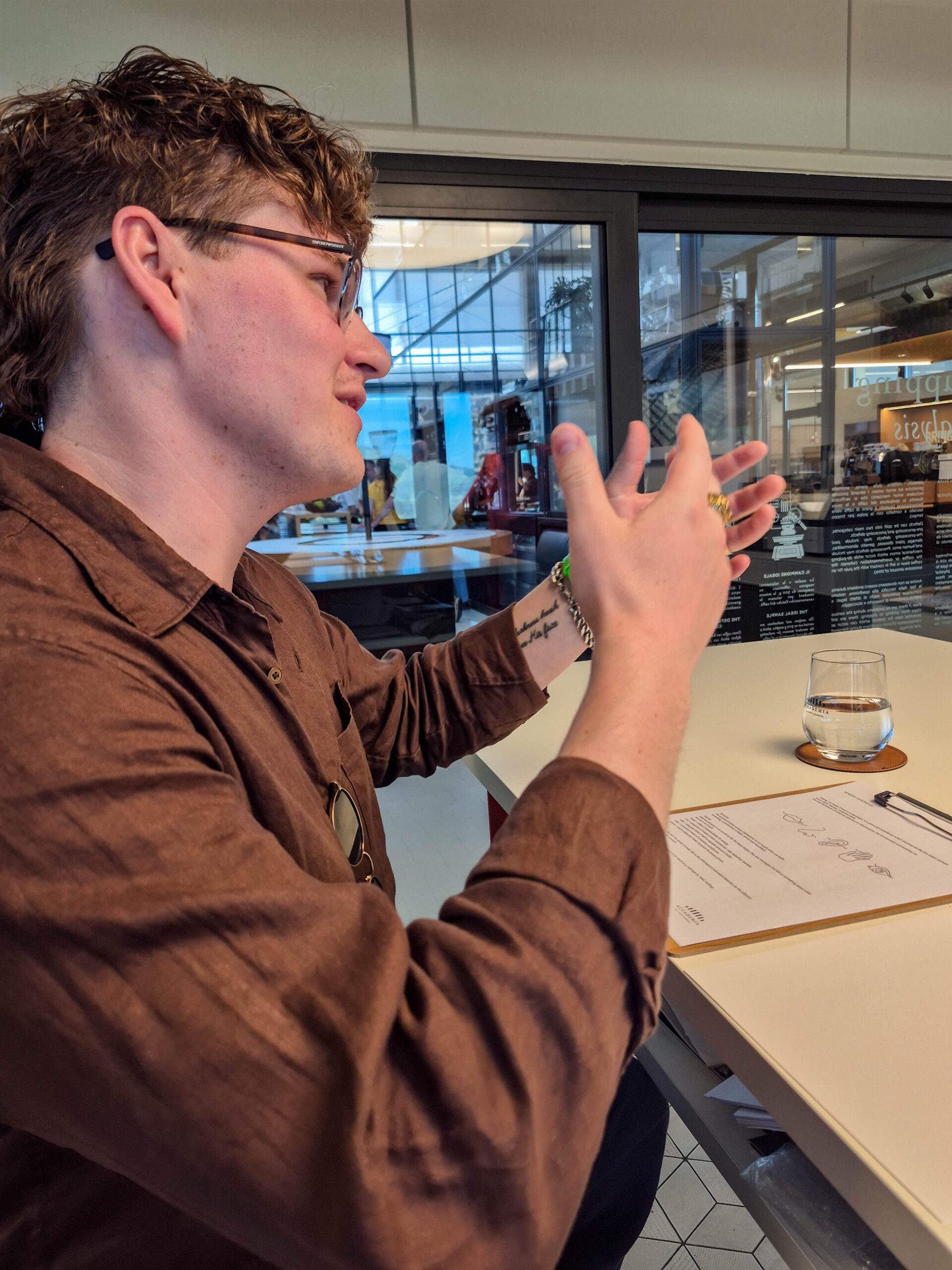 owner of Basta Coffee speaking educationally about espresso